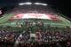 OTTAWA, ON - OCTOBER 24: The largest Canadian flag in the world is unfurled to show solidarity after the terror attack in Ottawa earlier in the week, prior to the game between the Ottawa Redblacks and the Montreal Alouettes at TD Place Stadium on October 24, 2014 in Ottawa, Ontario, Canada. (Photo by Jana Chytilova/Freestyle Photography/Getty Images)