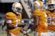 FILE - In this Sept. 17, 2016, file photo, Tennessee quarterback Joshua Dobbs (11) congratulates wide receiver Josh Malone (3) after scoring a touchdown in the second half of an NCAA college football game against Ohio in Knoxville, Tenn. Tennessee coach Butch Jones is in his fourth season on the job and believes his Volunteers have never faced a defense quite as good as the one Florida brings to Neyland Stadium this weekend. (AP Photo/Wade Payne, File)