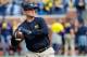 ANN ARBOR, MI - OCTOBER 01: Michigan Wolverines head football coach Jim Harbaugh warms up prior to the start of the game against the Wisconsin Badgers at Michigan Stadium on October 1, 2016 in Ann Arbor, Michigan. Michigan defeated Wisconsin 14-7. (Photo by Leon Halip/Getty Images)