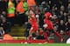 Liverpool's Brazilian midfielder Philippe Coutinho (L) celebrates scoring their second goal with Liverpool's Senegalese midfielder Sadio Mane (R) during the English Premier League football match between Liverpool and West Bromwich Albion at Anfield in Liverpool, north west England on October 22, 2016. / AFP / PAUL ELLIS / RESTRICTED TO EDITORIAL USE. No use with unauthorized audio, video, data, fixture lists, club/league logos or 'live' services. Online in-match use limited to 75 images, no video emulation. No use in betting, games or single club/league/player publications. / (Photo credit should read PAUL ELLIS/AFP/Getty Images)