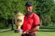 AKRON, OH - AUGUST 04: Tiger Woods holds the Gary Player Cup trophy after the Final Round of the World Golf Championships-Bridgestone Invitational at Firestone Country Club South Course on August 4, 2013 in Akron, Ohio. Woods won the tournament with a score of -15. (Photo by Sam Greenwood/Getty Images)