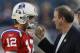 Former Buffalo Bills quarterback Jim Kelly, right, talks with New England Patriots quarterback Tom Brady before an NFL football game between the Bill and the Patriots on Monday, Sept. 14, 2009, in Foxborough, Mass. (AP Photo/Winslow Townson)