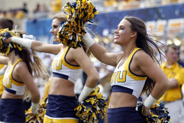 MORGANTOWN, WV - SEPTEMBER 26:  West Virginia Mountaineer cheerleaders in action during the game against the Maryland Terrapins on September 26, 2015 at Mountaineer Field in Morgantown, West Virginia.  (Photo by Justin K. Aller/Getty Images)