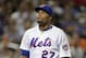 Jul 27, 2016; New York City, NY, USA; New York Mets relief pitcher Jeurys Familia (27) reacts as he heads to the dugout during the ninth inning against the St. Louis Cardinals at Citi Field. Mandatory Credit: Adam Hunger-USA TODAY Sports
