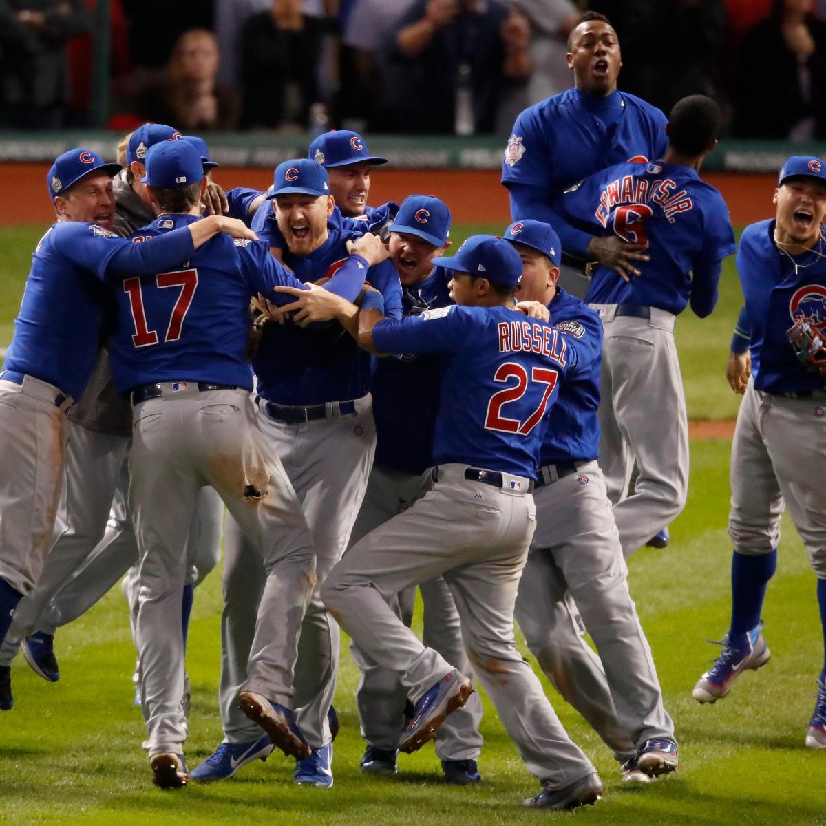 Chicago Cubs' Addison Russell (L) Anthony Rizzo and Kris Bryant (R)  celebrate a 5-1 win over the Cleveland Indians after game 2 of the World  Series at Progressive Field in Cleveland, Ohio