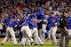 CLEVELAND, OH - NOVEMBER 02: The Chicago Cubs celebrate after defeating the Cleveland Indians 8-7 in Game Seven of the 2016 World Series at Progressive Field on November 2, 2016 in Cleveland, Ohio. The Cubs win their first World Series in 108 years. (Photo by Elsa/Getty Images)