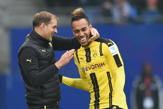 Pierre-Emerick Aubameyang from Dortmund celebrateS with coach Thomas Tuchel (L) his goal during the German first division Bundesliga football match between Hamburg SV and BVB Borussia Dortmund in Hamburg, northern Germany, on November 5, 2016.  / AFP / CARMEN JASPERSEN / RESTRICTIONS: DURING MATCH TIME: DFL RULES TO LIMIT THE ONLINE USAGE TO 15 PICTURES PER MATCH AND FORBID IMAGE SEQUENCES TO SIMULATE VIDEO. == RESTRICTED TO EDITORIAL USE == FOR FURTHER QUERIES PLEASE CONTACT DFL DIRECTLY AT + 49 69 650050
        (Photo credit should read CARMEN JASPERSEN/AFP/Getty Images)