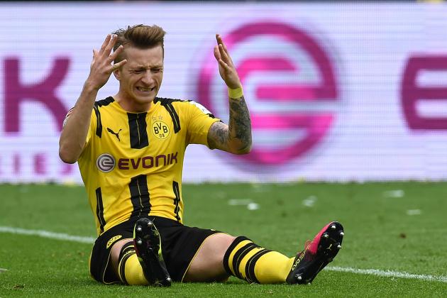 Dortmund's striker Marco Reus reacts during the German first division Bundesliga football match between Borussia Dortmund  and 1 FC Cologne, in Dortmund, western Germany, on May 14, 2016. / AFP / PATRIK STOLLARZ / RESTRICTIONS: DURING MATCH TIME: DFL RULES TO LIMIT THE ONLINE USAGE TO 15 PICTURES PER MATCH AND FORBID IMAGE SEQUENCES TO SIMULATE VIDEO. == RESTRICTED TO EDITORIAL USE == FOR FURTHER QUERIES PLEASE CONTACT DFL DIRECTLY AT + 49 69 650050
        (Photo credit should read PATRIK STOLLARZ/AFP/Getty Images)