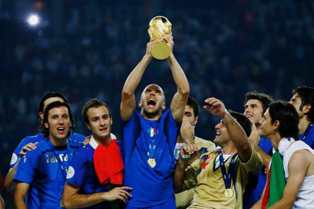 BERLIN - JULY 09:  Alessandro Del Piero of Italy holds the World Cup trophy aloft following his team's victory in a penalty shootout at the end of the FIFA World Cup Germany 2006 Final match between Italy and France at the Olympic Stadium on July 9, 2006 in Berlin, Germany.  (Photo by Shaun Botterill/Getty Images)