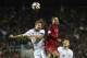Latvia's defender Kaspars Gorkss (L) vies with Portugal's forward Cristiano Ronaldo during the WC 2018 qualifying football match Portugal vs Latvia at the Algarve stadium in Faro on November 13, 2016. / AFP / FRANCISCO LEONG (Photo credit should read FRANCISCO LEONG/AFP/Getty Images)