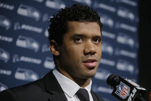 Seattle Seahawks quarterback Russell Wilson speaks to the media following an NFL football game against the New England Patriots, Monday, Nov. 14, 2016, in Foxborough, Mass. (AP Photo/Steven Senne)