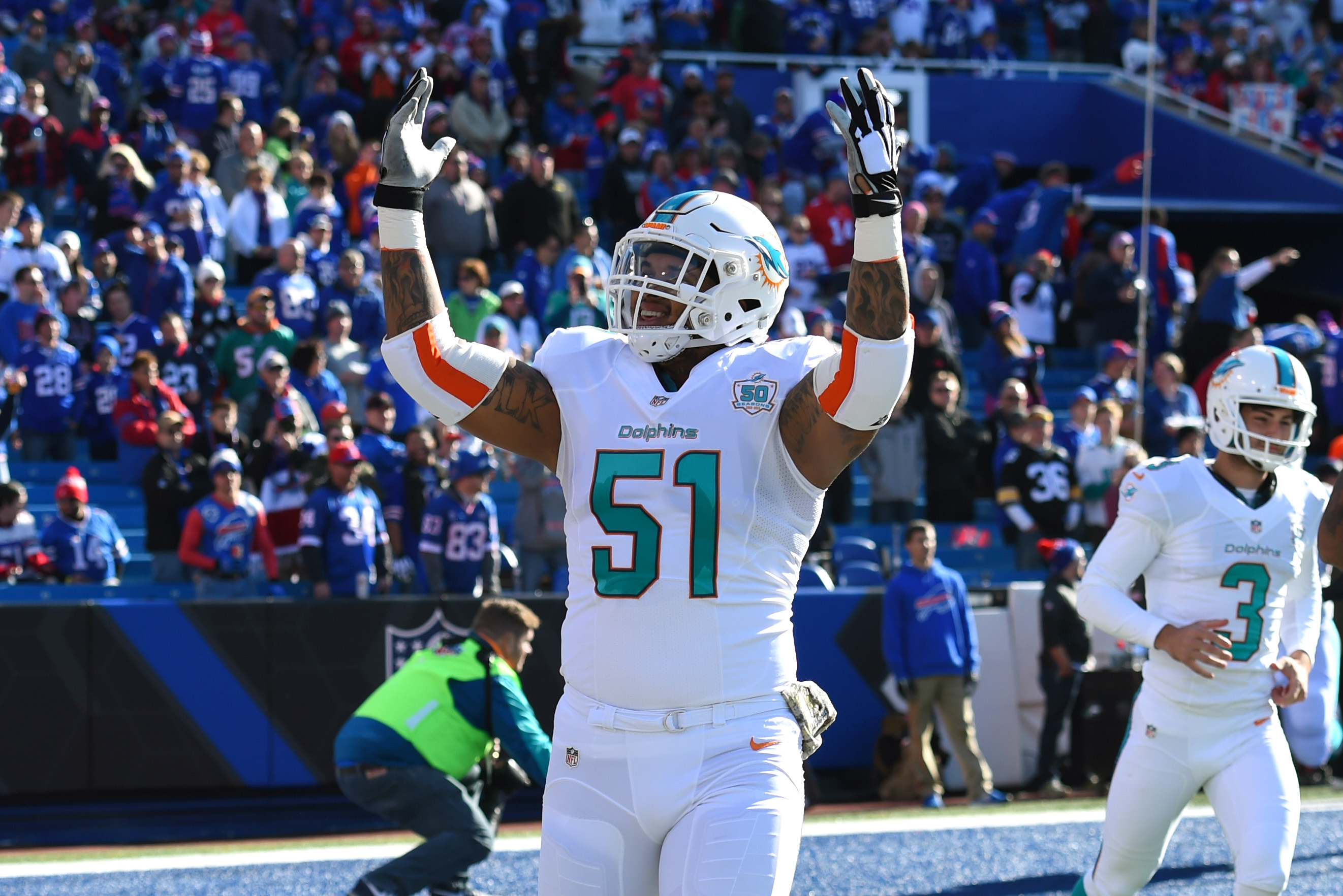 Miami dolphins center mike pouncey hi-res stock photography and