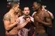 MELBOURNE, AUSTRALIA - NOVEMBER 26: (L-R) Opponents Robert Whittaker of New Zealand and Derek Brunson face off during the UFC weigh-in at Rod Laver Arena on November 26, 2016 in Melbourne, Australia. (Photo by Jeff Bottari/Zuffa LLC/Zuffa LLC via Getty Images)