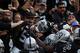 OAKLAND, CA - NOVEMBER 27: Khalil Mack #52 of the Oakland Raiders celebrates in the stands after scoring on an interception of Cam Newton #1 of the Carolina Panthers in the second quarter of their NFL game on November 27, 2016 in Oakland, California. (Photo by Thearon W. Henderson/Getty Images)