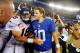 EAST RUTHERFORD, NJ - SEPTEMBER 15: (NEW YORK DAILIES OUT) Quarterbacks Peyton Manning #18 of the Denver Broncos and Eli Manning #10 of the New York Giants meet after their game on September 15, 2013 at MetLife Stadium in East Rutherford, New Jersey. The Broncos defeated the Giants 41-23. (Photo by Jim McIsaac/Getty Images)