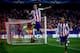 Diego Godin and Miranda celebrate.