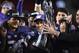 SANTA CLARA, CA - DECEMBER 02: Head coach Chris Petersen of the Washington Huskies is awarded the Pac-12 Championship game trophy after they beat the Colorado Buffaloes at Levi's Stadium on December 2, 2016 in Santa Clara, California. (Photo by Thearon W. Henderson/Getty Images)