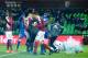 Metz' and Lyon's players react after a firecracker has exploded on the pitch during the French L1 football match between Metz (FCM) and Lyon (OL) on December 3, 2016 at Saint Symphorien stadium in Longeville-Les-Metz, eastern France. / AFP / JEAN-CHRISTOPHE VERHAEGEN (Photo credit should read JEAN-CHRISTOPHE VERHAEGEN/AFP/Getty Images)