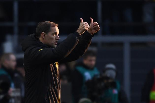 Dortmund's head coach Thomas Tuchel reacts during the German first division Bundesliga football match between Borussia Dortmund and Borussia Moenchengladbach at the Signal-Iduna-Park in Dortmund, western Germany, on December 03, 2016. / AFP / PATRIK STOLLARZ / RESTRICTIONS: DURING MATCH TIME: DFL RULES TO LIMIT THE ONLINE USAGE TO 15 PICTURES PER MATCH AND FORBID IMAGE SEQUENCES TO SIMULATE VIDEO. == RESTRICTED TO EDITORIAL USE == FOR FURTHER QUERIES PLEASE CONTACT DFL DIRECTLY AT + 49 69 650050
        (Photo credit should read PATRIK STOLLARZ/AFP/Getty Images)