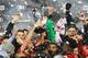 TORONTO, ON - NOVEMBER 30: Michael Bradley #4 of Toronto FC and teammates celebrate with the Eastern Conference Trophy following victory in the MLS Eastern Conference Final, Leg 2 game against Montreal Impact at BMO Field on November 30, 2016 in Toronto, Ontario, Canada. (Photo by Vaughn Ridley/Getty Images)