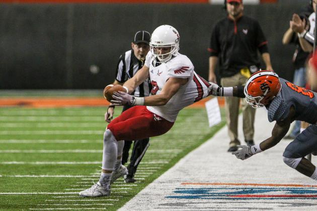 POCATELLO, ID - OCTOBER 17: Defensive back Erik Collins #8 of the Idaho State Bengals drags wide receiver Cooper Kupp #10 of the Eastern Washington Eagles out of bounds by his shirt during first half action on October 17, 2015 at Holt Arena in Pocatello, Idaho. (Photo by Loren Orr/Getty Images)