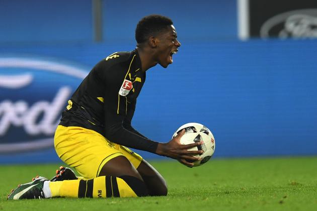 Dortmund's French midfielder Ousmane Dembele reacts during the German first division Bundesliga football match between 1 FC Cologne and Borussia Dortmund in Cologne western Germany, on December 10, 2016.  / AFP / PATRIK STOLLARZ / RESTRICTIONS: DURING MATCH TIME: DFL RULES TO LIMIT THE ONLINE USAGE TO 15 PICTURES PER MATCH AND FORBID IMAGE SEQUENCES TO SIMULATE VIDEO. == RESTRICTED TO EDITORIAL USE == FOR FURTHER QUERIES PLEASE CONTACT DFL DIRECTLY AT + 49 69 650050
        (Photo credit should read PATRIK STOLLARZ/AFP/Getty Images)