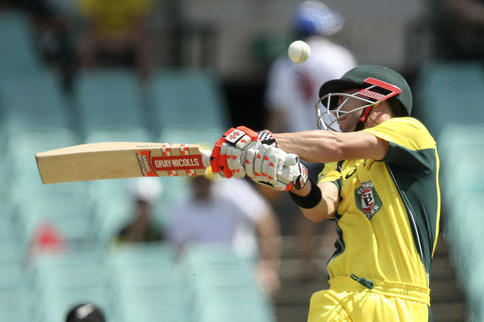 Australia's David Warner swings wildly at a delivery from New Zealand's Matt Henry during their one day international cricket match in Sydney Sunday, Dec. 4, 2016. (AP Photo/Rick Rycroft)