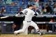 NEW YORK, NY - OCTOBER 01: Chase Headley #12 of the New York Yankees follows through on a sixth inning RBI double against the Baltimore Orioles at Yankee Stadium on October 1, 2016 in the Bronx borough of New York City. (Photo by Jim McIsaac/Getty Images)