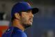 NEW YORK, NY - AUGUST 09: Matt Harvey #33 of the New York Mets looks on from the dugout during a game against the Arizona Diamondbacks at Citi Field on August 9, 2016 in the Flushing neighborhood of the Queens borough of New York City. (Photo by Rich Schultz/Getty Images)