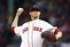 BOSTON, MA - OCTOBER 10: Clay Buchholz #11 of the Boston Red Sox throws a pitch in the first inning against the Cleveland Indians during game three of the American League Divison Series at Fenway Park on October 10, 2016 in Boston, Massachusetts. (Photo by Elsa/Getty Images)