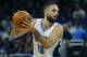 Orlando Magic guard Evan Fournier (10) looks to pass during an NBA basketball game in Orlando, Fla., on Friday, Dec. 16, 2016. The Orlando Magic beat the Brooklyn Nets 118-111. (AP Photo/Reinhold Matay)