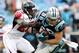 CHARLOTTE, NC - DECEMBER 24: Greg Olsen #88 of the Carolina Panthers runs the ball against Keanu Neal #22 of the Atlanta Falcons in the 2nd half during their game at Bank of America Stadium on December 24, 2016 in Charlotte, North Carolina. (Photo by Streeter Lecka/Getty Images)