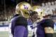 SANTA CLARA, CA - DECEMBER 02: Taylor Rapp #21 of the Washington Huskies is congratulated by Jojo McIntosh #14 after making his interception against the Colorado Buffaloes in the Pac-12 Championship game at Levi's Stadium on December 2, 2016 in Santa Clara, California. (Photo by Robert Reiners/Getty Images)