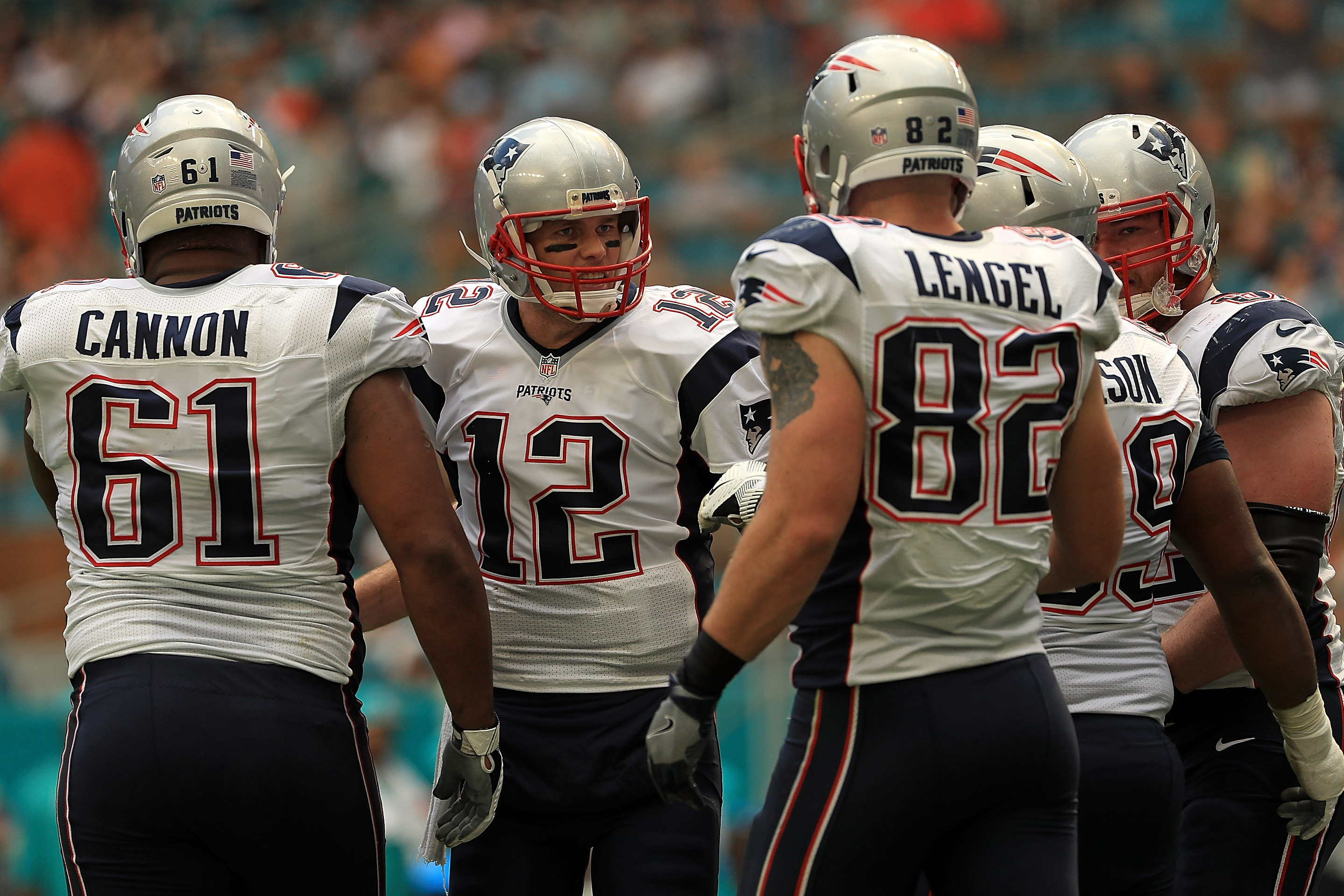 Brady throws for 3 scores to help Pats beat Miami 35-14