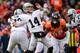 DENVER, CO - JANUARY 1: Quarterback Matt McGloin #14 of the Oakland Raiders throws downfield in the first quarter of the game against the Denver Broncos at Sports Authority Field at Mile High on January 1, 2017 in Denver, Colorado. (Photo by Dustin Bradford/Getty Images)