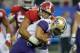ATLANTA, GA - DECEMBER 31: Jonathan Allen #93 of the Alabama Crimson Tide tackles Myles Gaskin #9 of the Washington Huskies during the 2016 Chick-fil-A Peach Bowl at the Georgia Dome on December 31, 2016 in Atlanta, Georgia. (Photo by Kevin C. Cox/Getty Images)