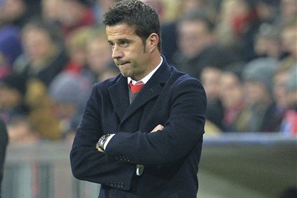 Olympiakos' head coach Marco Silva stands during the Champions League group F soccer match between FC Bayern Munich and Olympiakos in Munich, Germany, Tuesday, Nov. 24, 2015. (AP Photo/Kerstin Joensson)