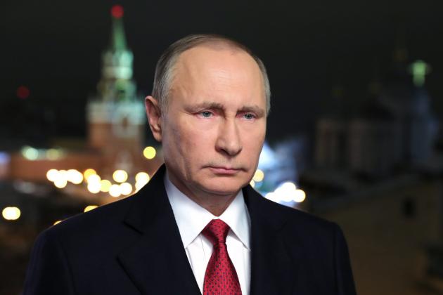 Russian President Vladimir Putin makes his New Year's address to the nation in Moscow's Kremlin, December 31, 2016. / AFP / Sputnik / Mikhail KLIMENTIEV (Photo credit should read MIKHAIL KLIMENTIEV/AFP/Getty Images)