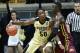 Purdue forward Caleb Swanigan (50) drives against Minnesota center Bakary Konate in the first half of an NCAA college basketball game, Sunday, Jan. 1, 2017, in West Lafayette, Ind. (AP Photo/R Brent Smith)