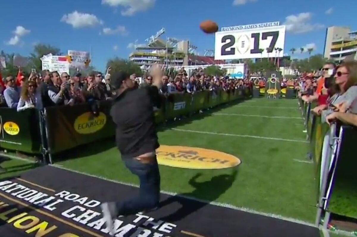 Fan's Football Throw Turns into a Blunder During CFP Festivities News