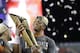 Clemson's Deshaun Watson holds up the championship trophy after the NCAA college football playoff championship game against Alabama Tuesday, Jan. 10, 2017, in Tampa, Fla. Clemson won 35-31. (AP Photo/David J. Phillip)