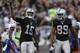 Oakland Raiders wide receiver Michael Crabtree (15) and wide receiver Amari Cooper (89) react during the second half of an NFL football game against the Buffalo Bills in Oakland, Calif., Sunday, Dec. 4, 2016. (AP Photo/D. Ross Cameron)