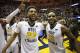 Esa Ahmad (23) and Tarik Phillip (12) celebrate a blowout win over No. 1 Baylor.