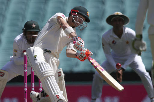 Australia's David Warner hits a six against Pakistan during their cricket test match in Sydney, Australia, Friday, Jan. 6, 2017. (AP Photo/Rick Rycroft)