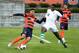 SYRACUSE, NY - NOVEMBER 22: Miles Robinson #19 of the Syracuse Orange controls the ball as Eduvie Ikoba #12 of the Dartmouth Big Green defends during the second half at the SU Soccer Stadium on November 22, 2015 in Syracuse, New York. Syracuse defeated Dartmouth 2-1. (Photo by Rich Barnes/Getty Images)