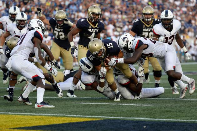 ANNAPOLIS, MD - SEPTEMBER 10: Quarterback Will Worth #15 of the Navy Midshipmen carries the ball against the Connecticut Huskies in the fourth quarter of Navy's 28-24 win at Navy-Marine Corps Memorial Stadium on September 10, 2016 in Annapolis, Maryland.  (Photo by Rob Carr/Getty Images)