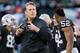 OAKLAND, CA - DECEMBER 24: Head coach Jack Del Rio of the Oakland Raiders looks up at the scoreboard as quarterback Derek Carr #4 of the Oakland Raiders is helped off the field with a broken leg against the Indianapolis Colts in the fourth quarter on December 24, 2016 at Oakland-Alameda County Coliseum in Oakland, California. The Raiders won 33-25. (Photo by Brian Bahr/Getty Images)