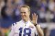 Former Indianapolis Colts quarterback Peyton Manning claps as the team honored the 2006 Super Bowl winning team during half time of an NFL football game in Indianapolis, Sunday, Nov. 20, 2016. (AP Photo/Darron Cummings)