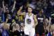 Golden State Warriors' Stephen Curry (30) points after scoring against the Miami Heat during the first half of an NBA basketball game Tuesday, Jan. 10, 2017, in Oakland, Calif. (AP Photo/Marcio Jose Sanchez)