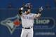 TORONTO, ON - OCTOBER 14: Josh Hamilton #32 of the Texas Rangers reacts after doubling in the sixth inning against the Toronto Blue Jays in game five of the American League Division Series at Rogers Centre on October 14, 2015 in Toronto, Canada. (Photo by Vaughn Ridley/Getty Images)
